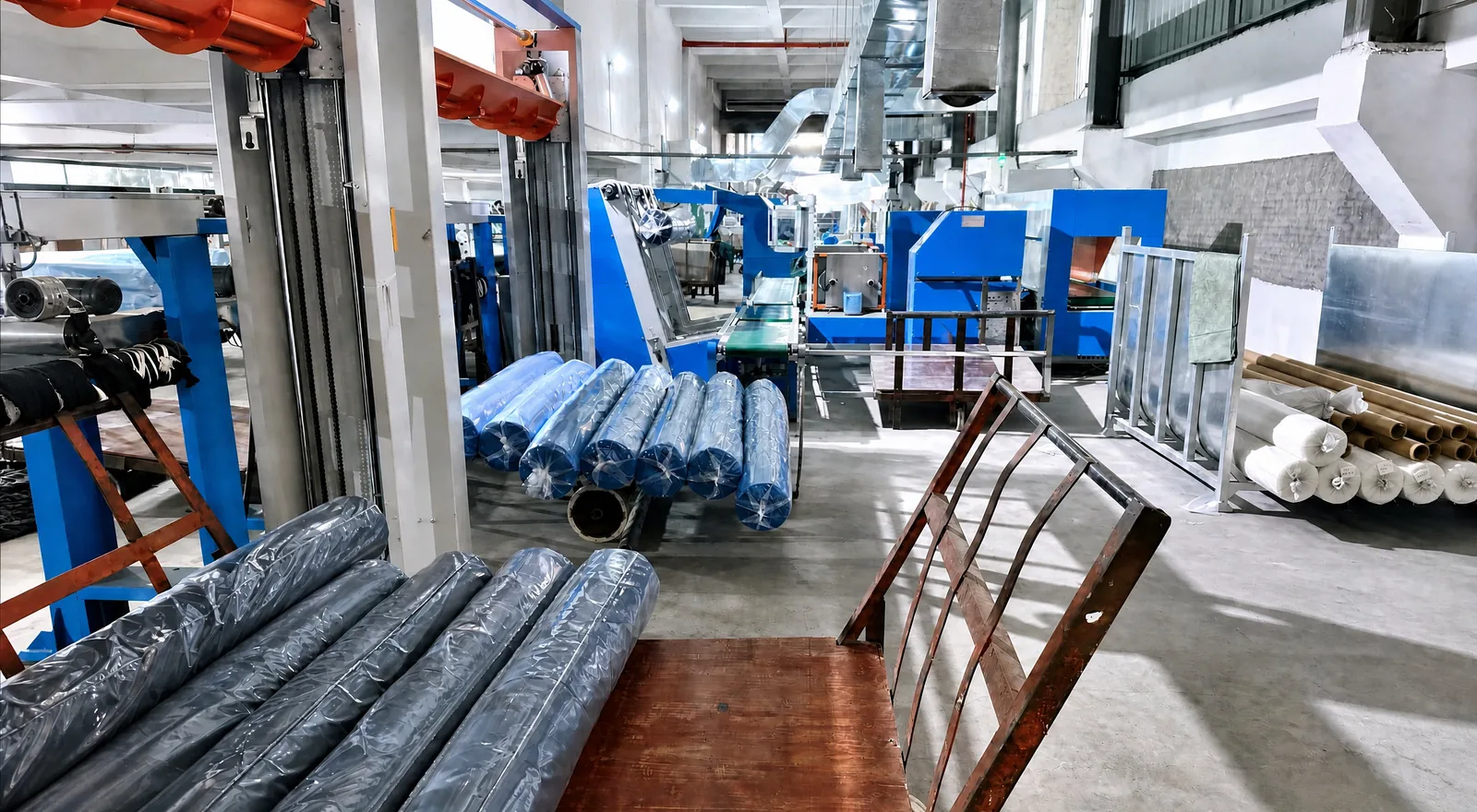 Finished fabric rolls prepared for quality inspection at Shengchao Textile